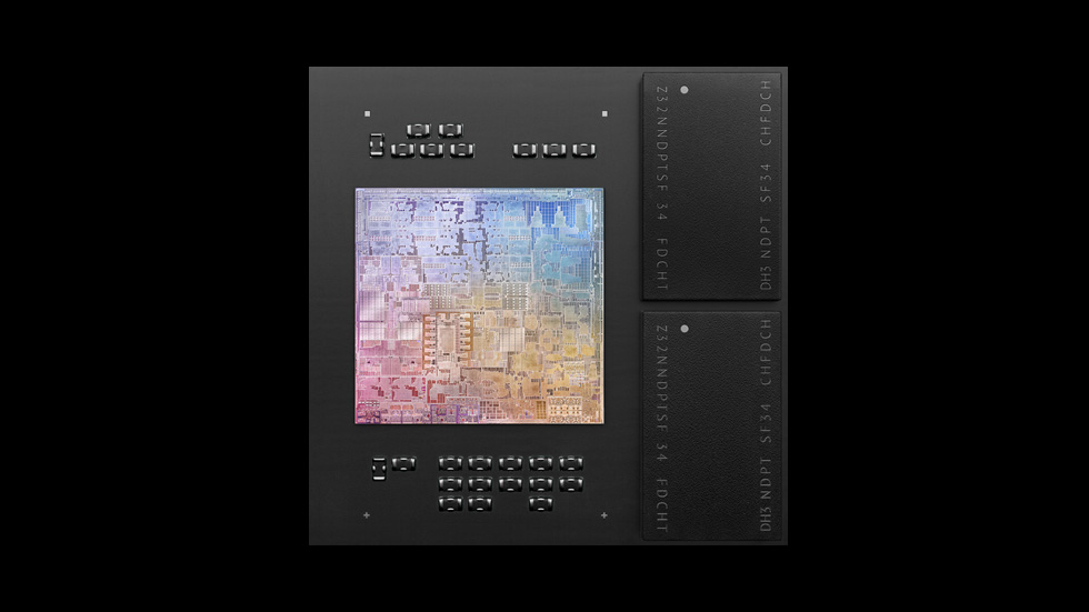 Top view of the M1 die showing the system on a chip's circuitry alongside two memory packages